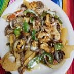 Best Nachos fajitas steak & grilled chicken mix in Lake City, AR